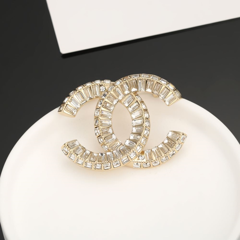 Ch**el brooches